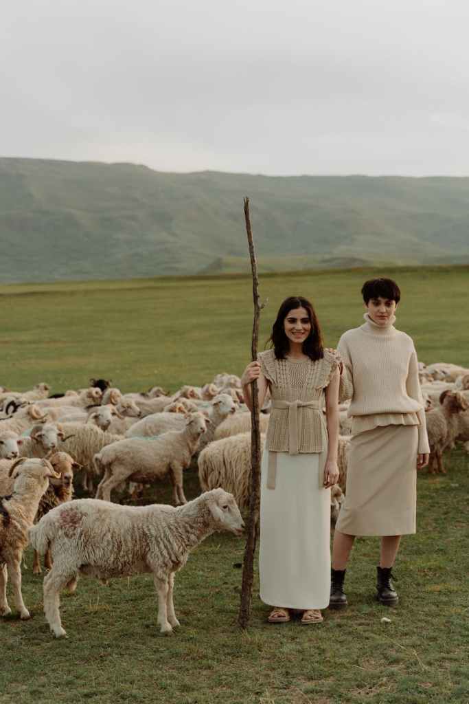 Two women shepherds and their flock